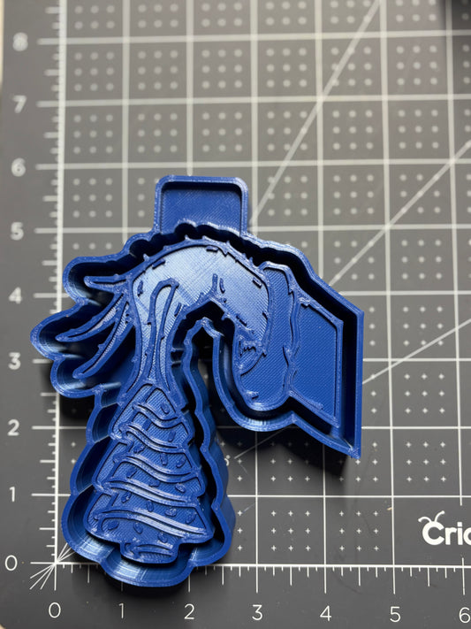 Grumpy Holding a Snacky Cake Mold