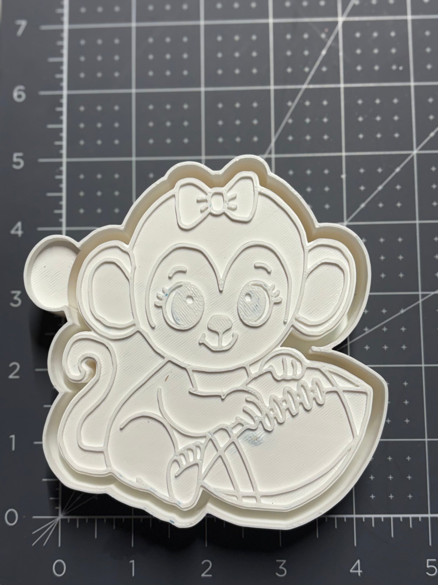 Monkey holding Football Mold