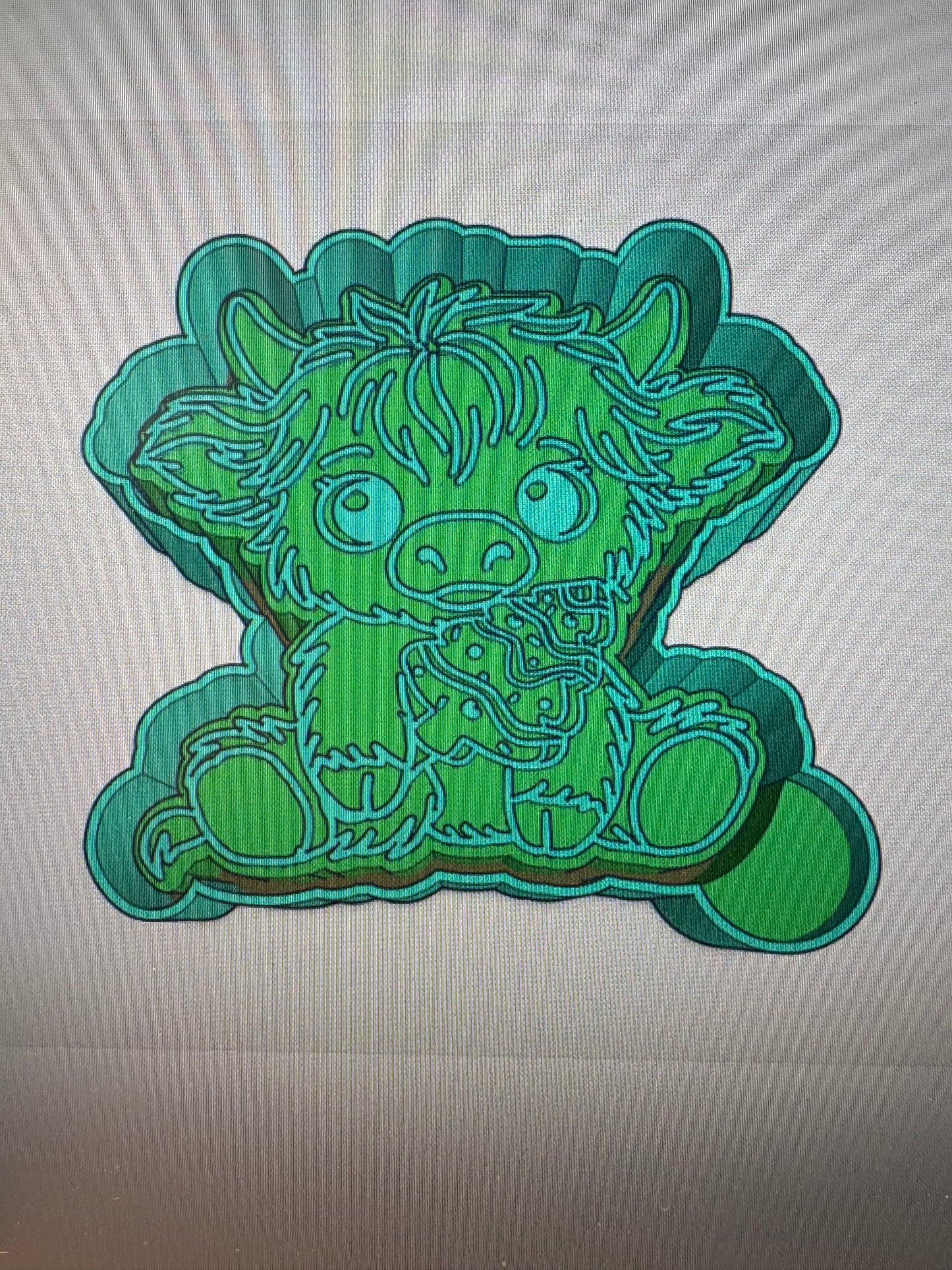 Highland holding a Christmas Cake Mold